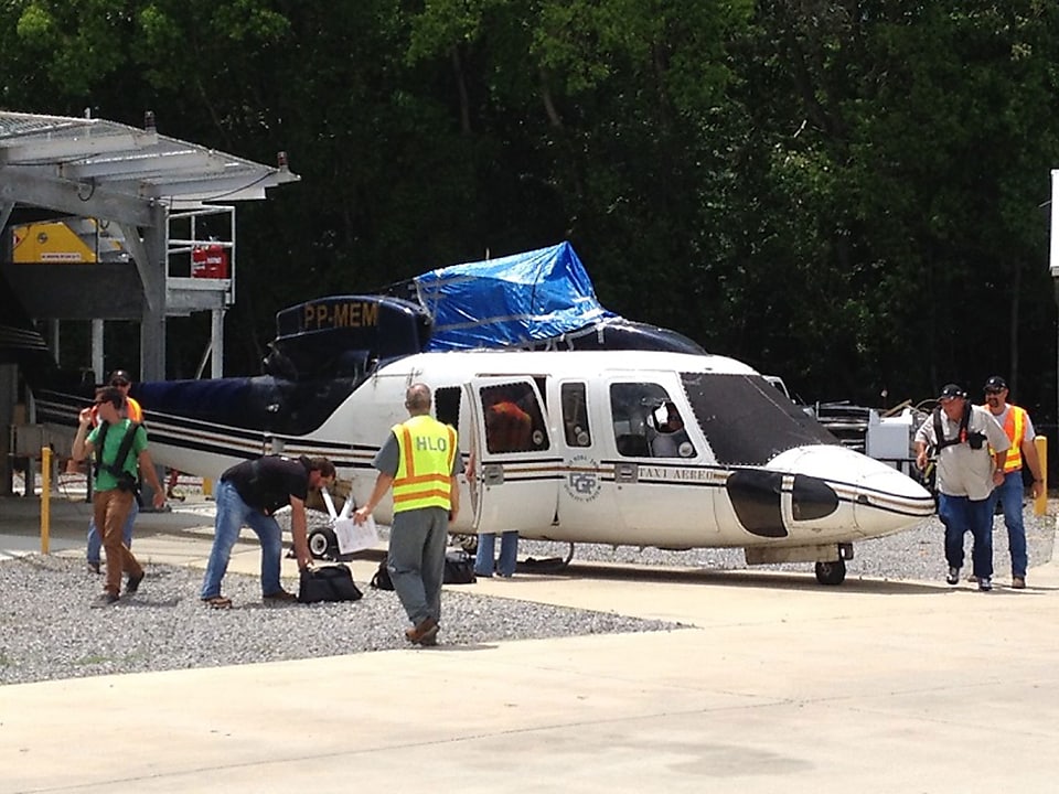 Practicing boarding a chopper at Robert Training and Conference Center