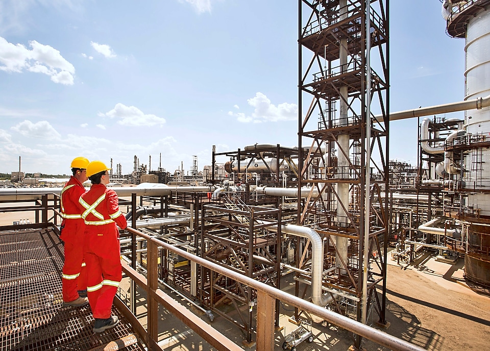Two Shell engineers looking over Carbon Capture and Storage